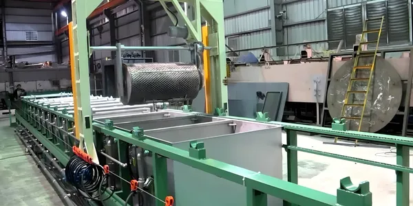 Elcometer coating thickness gauge and salt spray chamber verifying surface treatment quality and corrosion resistance